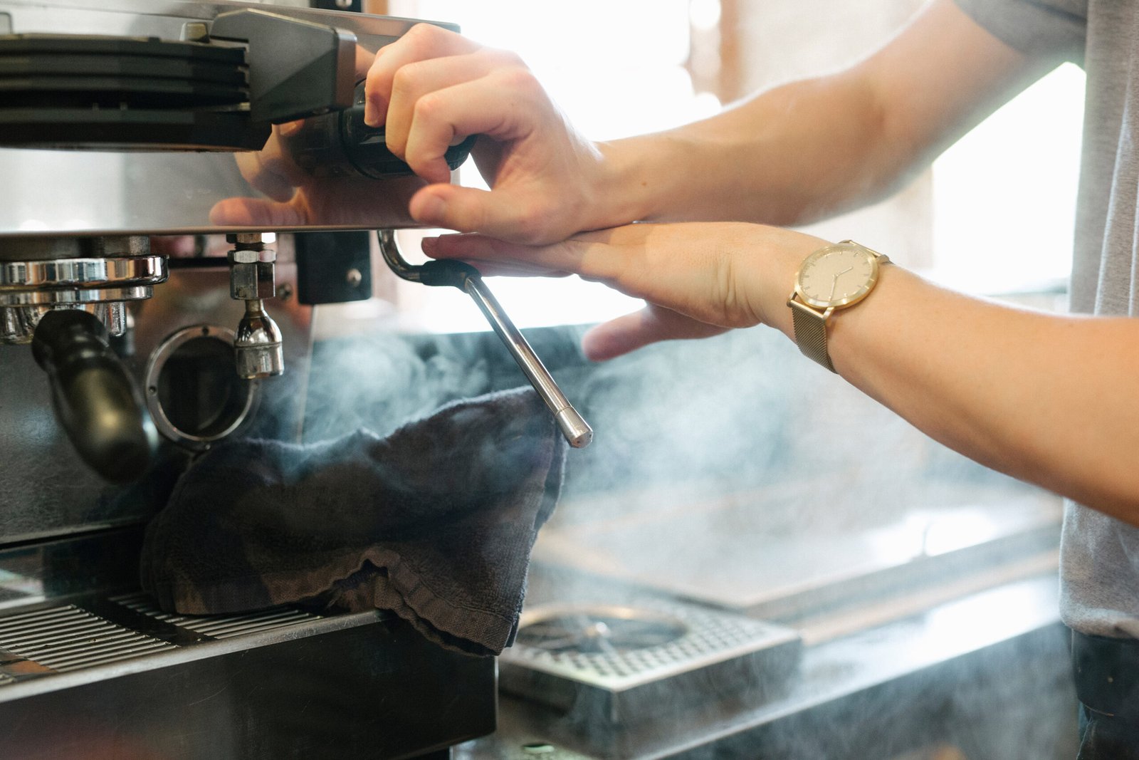 steam-coming-out-of-a-commercial-espresso-machine